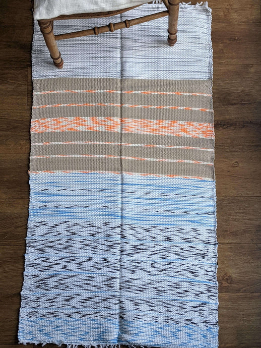 Handmade blue white and orange pattern cotton rug
