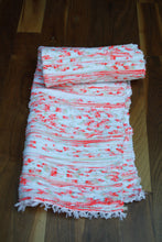 Load image into Gallery viewer, Handwoven Orange white pattern cotton rug rolled up