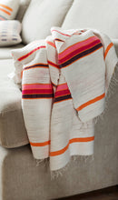 Load image into Gallery viewer, Handmade cotton orange and pink blanket on sofa