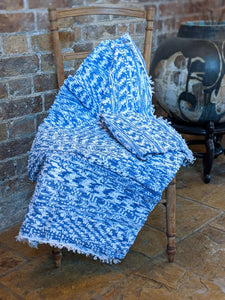 Handmade handwoven cotton blue white rug on chair