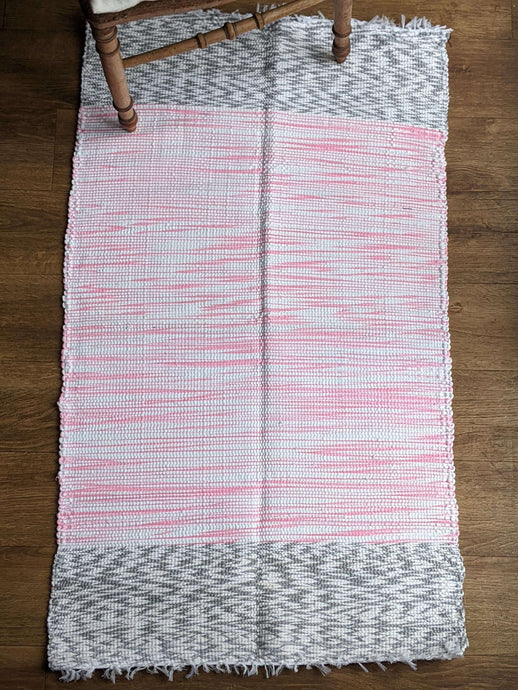 Handmade handwoven cotton pink grey pattern rug