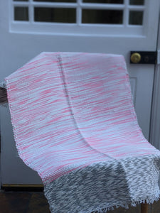 Handmade handwoven cotton pink grey pattern rug on chair