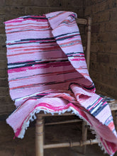 Load image into Gallery viewer, Handmade handwoven pink pattern rug on a chair