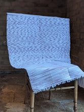 Load image into Gallery viewer, Handwoven handmade purple white cotton rug folded on chair