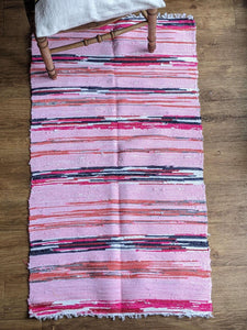 Handmade handwoven pink pattern rug