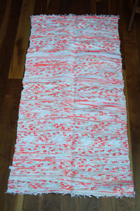Handwoven Orange white pattern cotton rug
