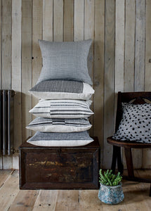 Stack of handmade black white pattern cotton cushion covers